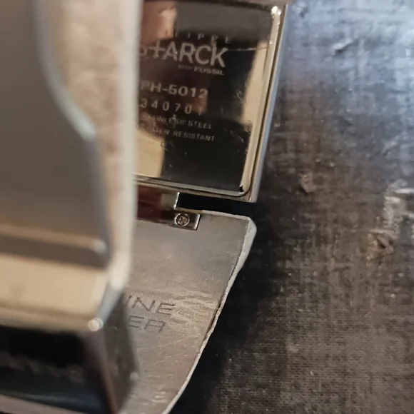 Lady's Phillipe Starck with Fossil Watch Co. White band - Picture 5 of 9